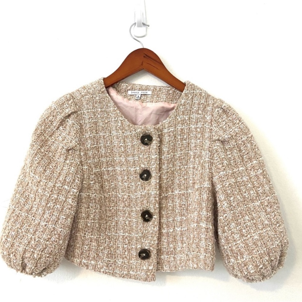 - Ivory rose little jacket.